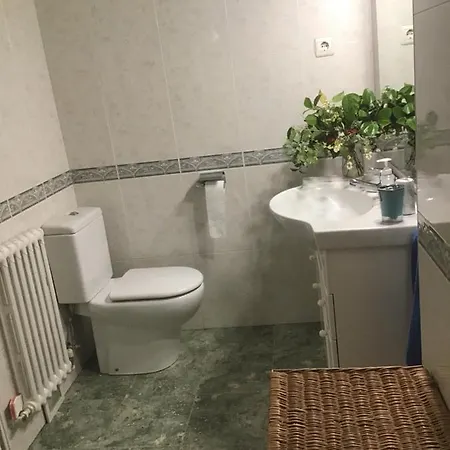 Δωμάτια σε οικογενειακή κατοικία Superviews Y Parking Vigilado En Independiente, Bano Privado, En Particular, Francais&english